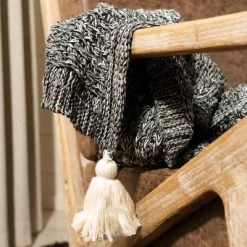 Pennie Knit Tassel Throw Blanket - Black/Natural - 50" X 60" - Safavieh -Safavieh Store GUEST 5c4a859c 567b 44e7 b356 e249a850e80e