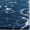2'3"x4' Swirl Loomed Accent Rug Dark Blue/Cream - Safavieh -Safavieh Store GUEST ca9bbcb6 51e7 4060 b08b 17c1e1c64cd2
