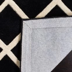 Christy Geometric Tufted Area Rug - Safavieh -Safavieh Store GUEST d946e68c 591d 4c17 9a58 e78f54fa6ad1