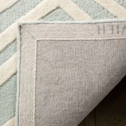 Safavieh Kids SFK910 Hand Tufted Area Rug - Safavieh -Safavieh Store GUEST f320feed 6e60 4952 96ce bfe3189f733d